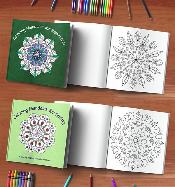 two open coloring books with pencils and crayons scattered around